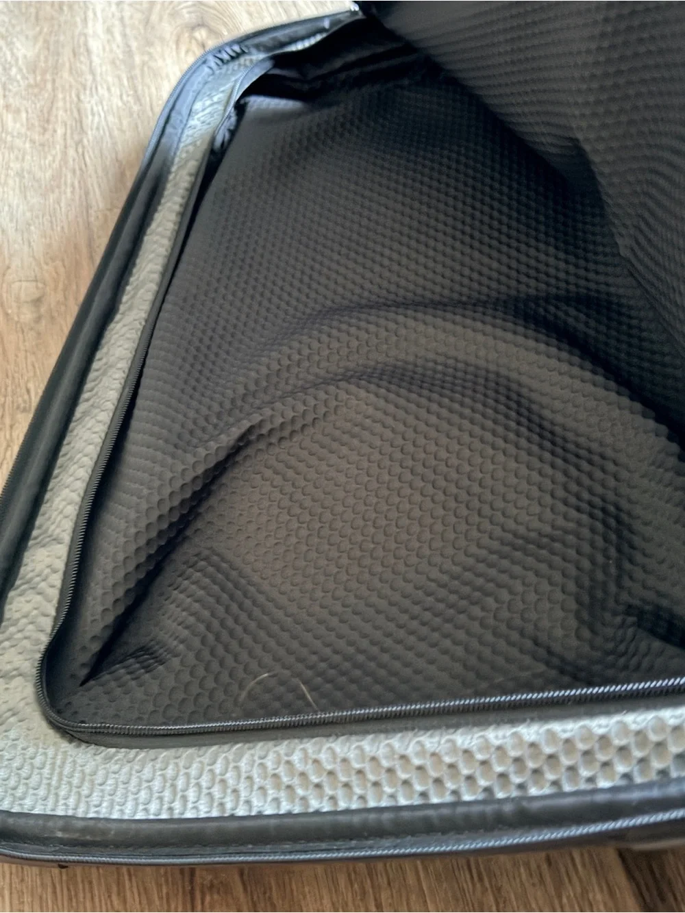 Tumi Black Rolling Suitcase with Front Pocket